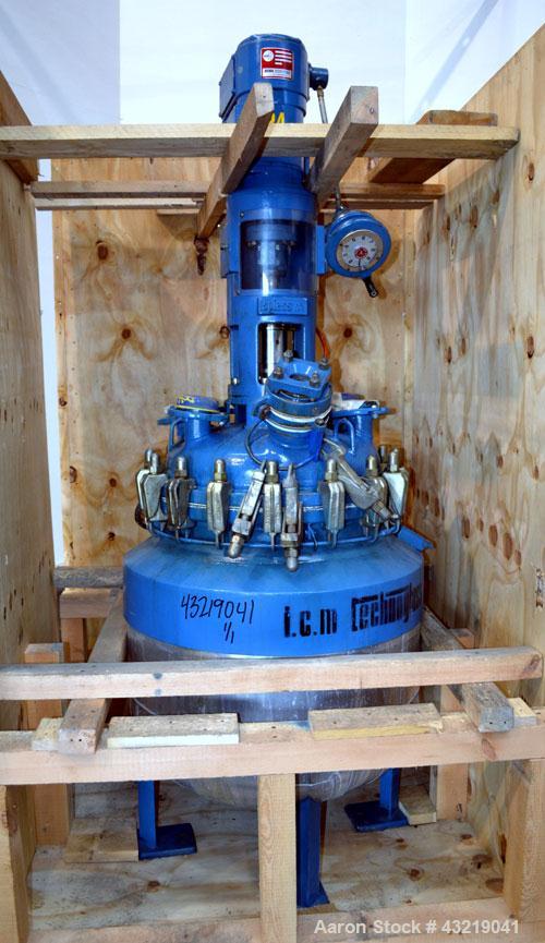 Used Technoglass Glass Lined Reactor, 210 Liter (55.4 Gallon), Vertical. Approximate 24" diameter x 24" straight side. Clamp on dished top, dish bottom. Internal rated 6/-1 bar (87/-14.5 psi) at -20 ...