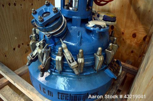 Used Technoglass Glass Lined Reactor, 210 Liter (55.4 Gallon), Vertical. Approximate 24" diameter x 24" straight side. Clamp on dished top, dish bottom. Internal rated 6/-1 bar (87/-14.5 psi) at -20 ...