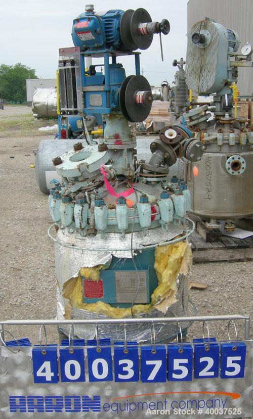 Used Pfaudler Glass Lined Clamp Top Reactor, 30 gallon, 9115 glass, vertical. Approximately 22" diameter x 22" straight side, clamp dished top, dished bottom. Internal rated 150/fv psi at 450 deg F, ...