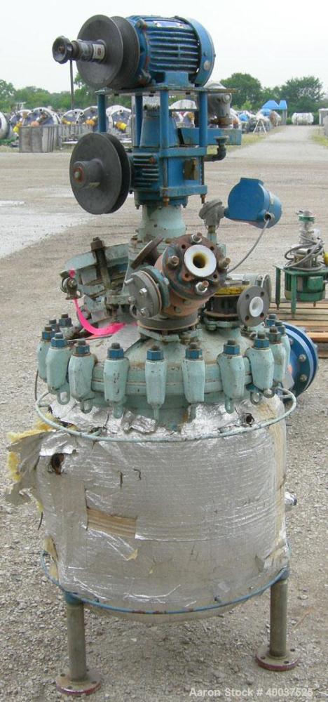 Used Pfaudler Glass Lined Clamp Top Reactor, 30 gallon, 9115 glass, vertical. Approximately 22" diameter x 22" straight side, clamp dished top, dished bottom. Internal rated 150/fv psi at 450 deg F, ...