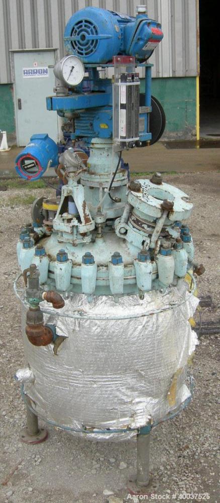 Used Pfaudler Glass Lined Clamp Top Reactor, 30 gallon, 9115 glass, vertical. Approximately 22" diameter x 22" straight side, clamp dished top, dished bottom. Internal rated 150/fv psi at 450 deg F, ...