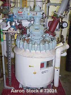 USED: Pfaudler 50 gallon glass lined reactor. Internal rated 150 psifull vacuum at 450 deg F, jacket rated 135 psi. 24" diameter, clampeddish top, conical bottom. Sight glass with hinged cover. 2.5 D...