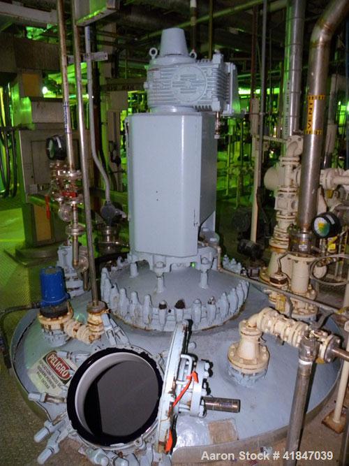 Used Pfaudler Glass Lined Reactor, 3000 gallon, model RA96-3000-100-90, 9129 white glass with calibration lines, vertical. Approximately 96" diameter x 96" straight side. Dished top and bottom. Inter...