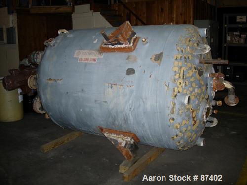USED: Pfaudler glass lined reactor, 750 gallons, 5015 glass, vertical, 60" diameter x 55" straight side. Dished top and bottom. Internal rated 100 psi/FV at 450 deg F, carbon steel jacket rated at 90...