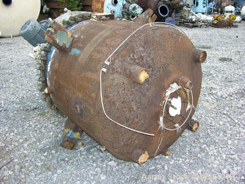 Used Pfaudler Clamp Top Glass Lined Reactor, 200 gallon, 5025 white glass. Approximately 42" diameter x 32" straight side, clamp dished top, dished bottom. Internal rated 100 psi/ FV at 450 deg F, ja...