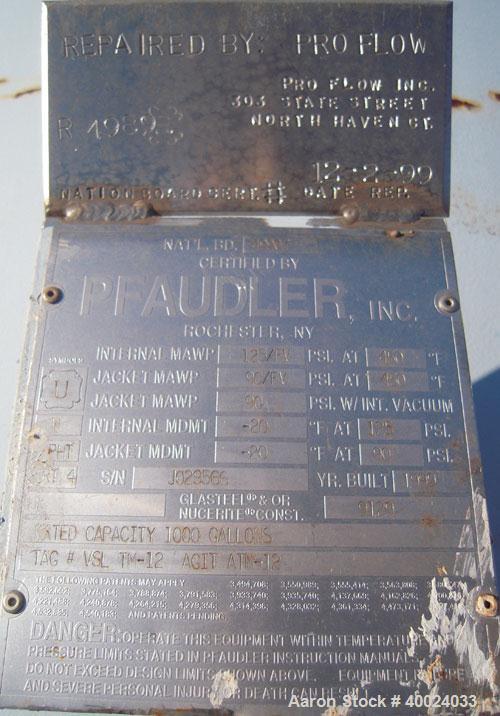 Used Pfaudler K Series Glass Lined Reactor, 1000 gallon, 9129 white glass with calibration lines. Approximately 5' diameter x 6' straight side, dished top and bottom. Internal rated 125 psi and full ...