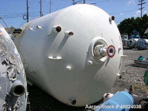 Used Pfaudler Glass Lined Reactor, 2000 gallon, 3009 white glass with calibration lines. Approximately 76" diameter x 88" straight side, dished top and bottom. 5DTW drive with approximately 10 hp mot...