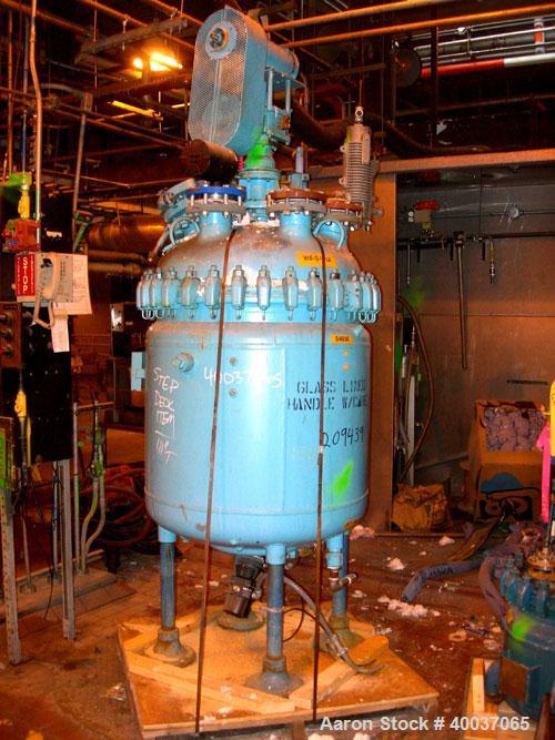 Used: Pfaudler glass lined clamp top reactor, 100 gallon, 5015 glass, vertical. Approximately 36" diameter x 36" straight side, clamp dished top, dished bottom. Internal rated 100/fv psi at 450 deg.f...