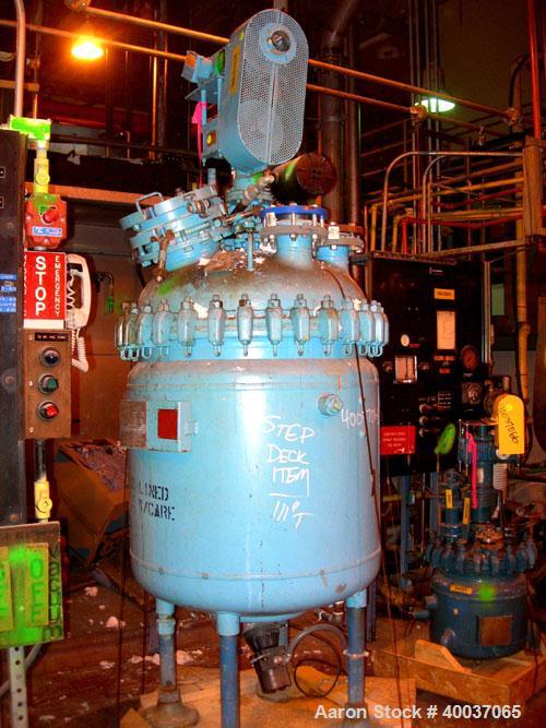 Used: Pfaudler glass lined clamp top reactor, 100 gallon, 5015 glass, vertical. Approximately 36" diameter x 36" straight side, clamp dished top, dished bottom. Internal rated 100/fv psi at 450 deg.f...