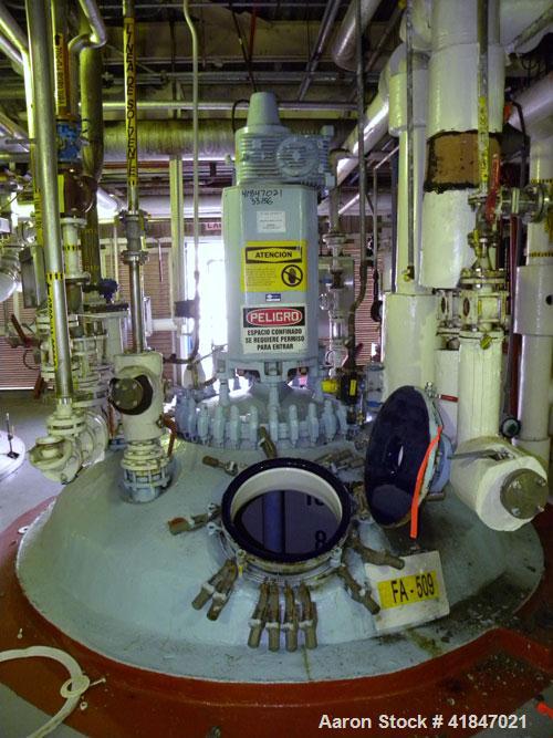 Used Pfaudler Glass Lined Reactor, 3000 gallon, 9129 white glass with calibration lines, vertical. Approximately 96" diameter x 96" straight side. Dished top and bottom. Internal rated 100/FV psi at ...