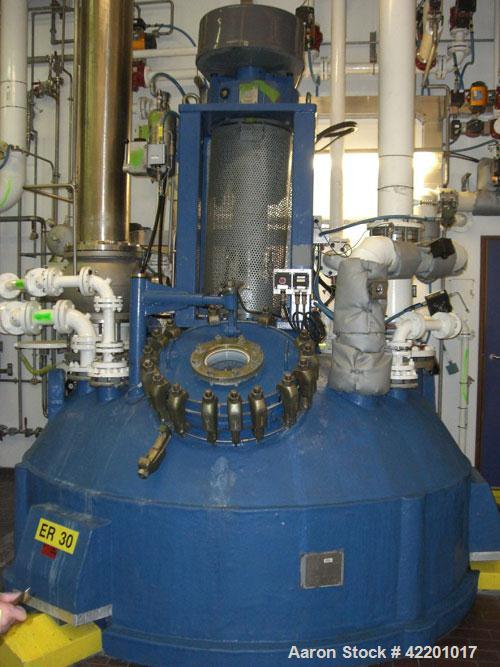 Used Pfaudler Glass Lined Reactor, 9145 glass, vertical. Approximately 3303 gallon  (12,500 liter) working capacity. Dished welded top and bottom. Internal rated 6.6 bar/full vacuum (95 psi/FV) at -2...