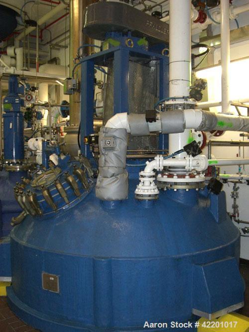 Used Pfaudler Glass Lined Reactor, 9145 glass, vertical. Approximately 3303 gallon  (12,500 liter) working capacity. Dished welded top and bottom. Internal rated 6.6 bar/full vacuum (95 psi/FV) at -2...