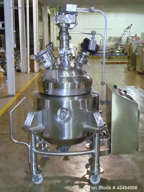 Used Pfaudler Glass Lined Reactor, 30 Gallon. Dished top, coned bottom. Internal rated 100 psi & FV at 450/-100 degrees F, stainless steel jacket rated 90 psi at 350/-100 degrees F.. Pfaudler DTW agi...