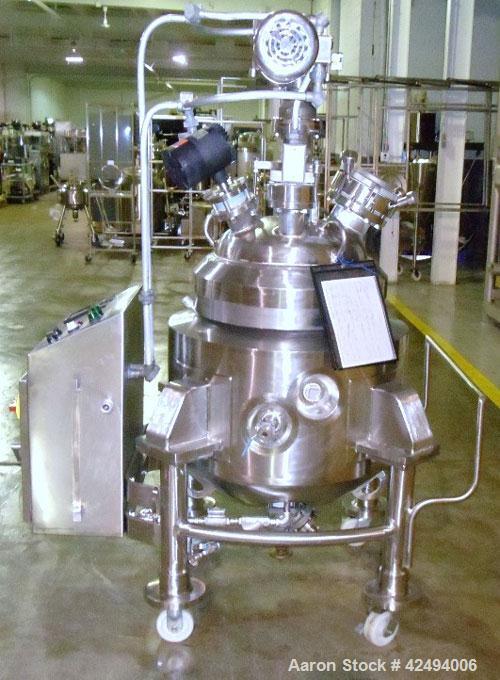 Used Pfaudler Glass Lined Reactor, 30 Gallon. Dished top, coned bottom. Internal rated 100 psi & FV at 450/-100 degrees F, stainless steel jacket rated 90 psi at 350/-100 degrees F.. Pfaudler DTW agi...