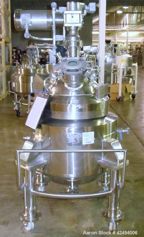 Used Pfaudler Glass Lined Reactor, 30 Gallon. Dished top, coned bottom. Internal rated 100 psi & FV at 450/-100 degrees F, stainless steel jacket rated 90 psi at 350/-100 degrees F.. Pfaudler DTW agi...