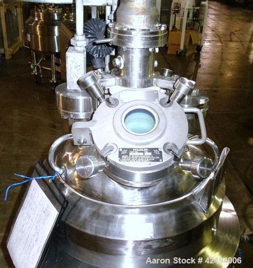 Used Pfaudler Glass Lined Reactor, 30 Gallon. Dished top, coned bottom. Internal rated 100 psi & FV at 450/-100 degrees F, stainless steel jacket rated 90 psi at 350/-100 degrees F.. Pfaudler DTW agi...