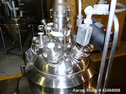 Used Pfaudler Glass Lined Reactor, 30 Gallon. Dished top, coned bottom. Internal rated 100 psi & FV at 450/-100 degrees F, stainless steel jacket rated 90 psi at 350/-100 degrees F.. Pfaudler DTW agi...