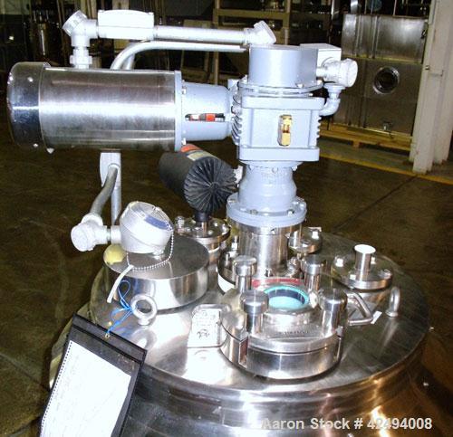 Used- Pfaudler Glass Lined Reactor, 15 Gallon. Flat top, coned bottom. Internal rated 100 PSI & FV at 450 Degrees F, stainle...