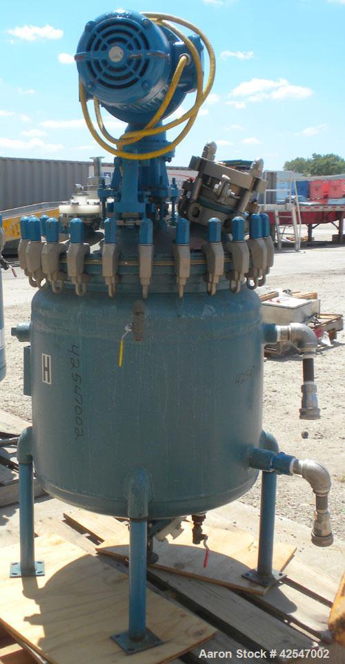Used Pfaudler Glass Lined Reactor, 50 gallon, 5015 blue glass, vertical. Approximate 26" diameter x 18" straight side, Clamp dish top, dish bottom. Internal rated 25 psi/full vacuum at 450 deg F, car...