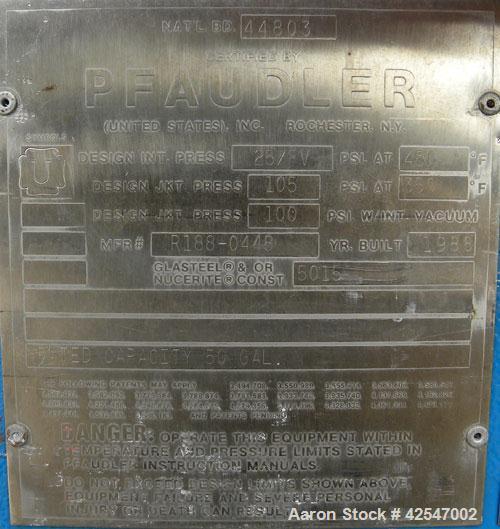 Used Pfaudler Glass Lined Reactor, 50 gallon, 5015 blue glass, vertical. Approximate 26" diameter x 18" straight side, Clamp dish top, dish bottom. Internal rated 25 psi/full vacuum at 450 deg F, car...