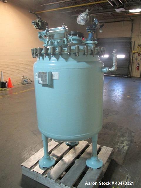 Used Pfaudler Glass Lined Reactor, 100 Gallon, 3315 Glass. Removable dome top, dish bottom. Internal rated 25 psi & Full Vacuum at 650 degrees F. Jacket rated 75 psi at 350 degrees F. Mounted on legs...