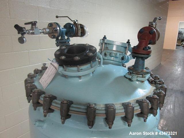 Used Pfaudler Glass Lined Reactor, 100 Gallon, 3315 Glass. Removable dome top, dish bottom. Internal rated 25 psi & Full Vacuum at 650 degrees F. Jacket rated 75 psi at 350 degrees F. Mounted on legs...