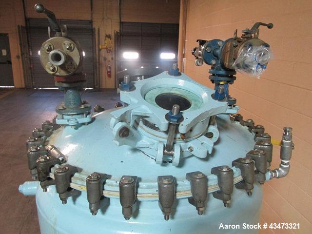 Used Pfaudler Glass Lined Reactor, 100 Gallon, 3315 Glass. Removable dome top, dish bottom. Internal rated 25 psi & Full Vacuum at 650 degrees F. Jacket rated 75 psi at 350 degrees F. Mounted on legs...