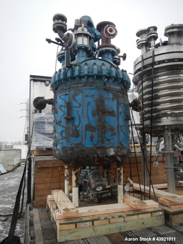 Used Pfaudler Glass Lined Reactor, 100 Gallon. Internal rated 25 psi & Full Vacuum at 650 degrees F, jacket rated 90 psi at 350 degrees F. Pfaudler DTW agitator drive with mechanical seal, three blad...