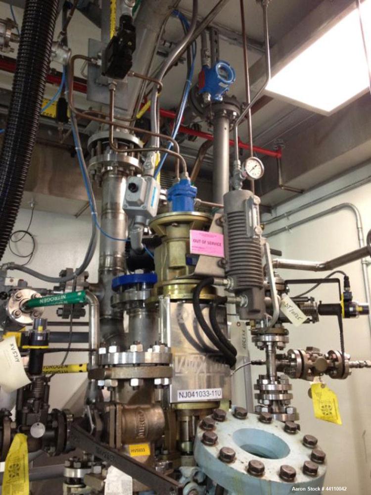 Used Pfaudler Glass Lined Reactor, 100 Gallon. Internal rated 300 psi & Full Vacuum at 450 degrees F, jacket rated 150 psi & Full Vacuum at 450 degrees F.  Type 9119 Dark Blue Glass.  Clamped top. 31...