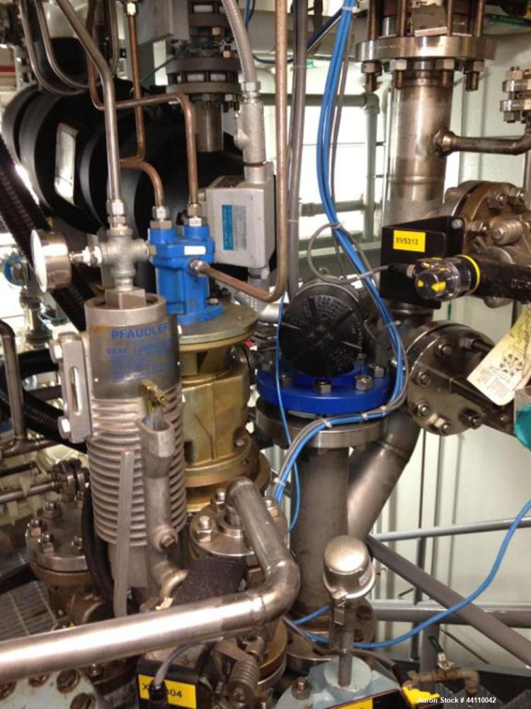 Used Pfaudler Glass Lined Reactor, 100 Gallon. Internal rated 300 psi & Full Vacuum at 450 degrees F, jacket rated 150 psi & Full Vacuum at 450 degrees F.  Type 9119 Dark Blue Glass.  Clamped top. 31...