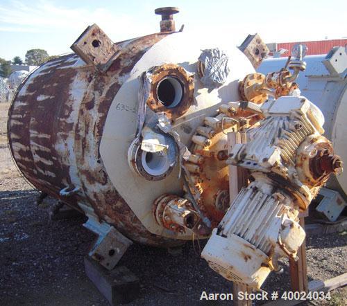 Used Pfaudler Glass Lined Reactor, 1000 gallon, 5025 white glass with calibration lines. Approximately 5' diameter x 6' straight side, dished top and bottom. Jacketed. FDWV52300-7B drive, 15 to 1 rat...
