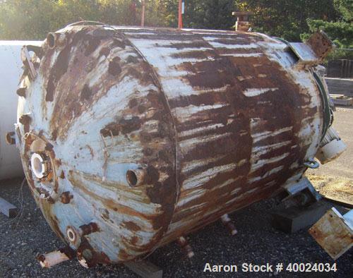 Used Pfaudler Glass Lined Reactor, 1000 gallon, 5025 white glass with calibration lines. Approximately 5' diameter x 6' straight side, dished top and bottom. Jacketed. FDWV52300-7B drive, 15 to 1 rat...