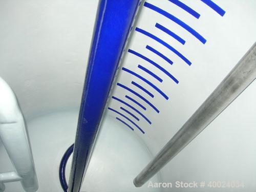 Used Pfaudler Glass Lined Reactor, 1000 gallon, 5025 white glass with calibration lines. Approximately 5' diameter x 6' straight side, dished top and bottom. Jacketed. FDWV52300-7B drive, 15 to 1 rat...
