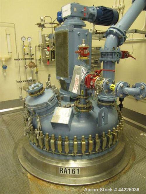 Used Tycon Glass Lined Reactor, 700 Gallon / 2,649 Liters.  Type 808 Glass. Internal rated 150 psi and full vacuum at 450 degrees F, jacket rated 100 psi at 450 degrees F. Full clamp top with air ope...