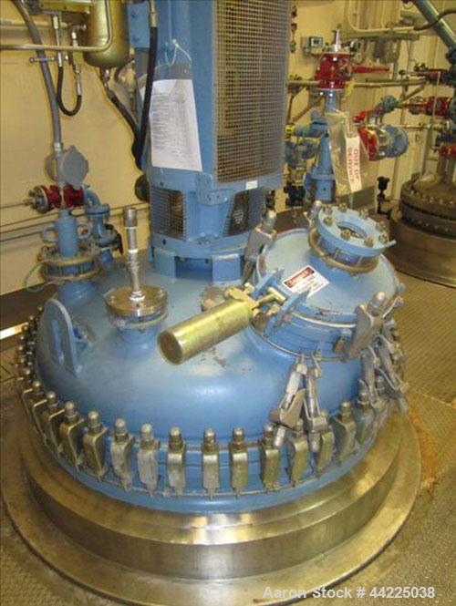 Used Tycon Glass Lined Reactor, 700 Gallon / 2,649 Liters.  Type 808 Glass. Internal rated 150 psi and full vacuum at 450 degrees F, jacket rated 100 psi at 450 degrees F. Full clamp top with air ope...