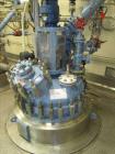 Used Tycon Glass Lined Reactor, 200 Gallon, Type 808 Glass. Internal rated 150 psi and full vacuum at 450 degrees F, jacket rated 150 psi and full vacuum at 450 degrees F. Full clamp top, 3 blade ret...