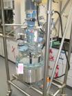 Used Buchi Glass Reactor, 30 Liter (7.9 Gallon). Internal rated +0.5/-1.0 bar at +200/-50 degrees C, jacket rated +10/-1.0 bar at +200/-60 degrees C. Bolted glass dished top, welded glass-lined (whit...