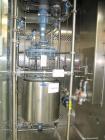 Used Buchi Glass Reactor, 100 Liter (26.4 Gallon). Internal rated +0.4/-1.0 bar at +200/-85 degrees C, jacket rated +10/-1.0 bar at +200/-85 degrees C. Bolted glass dished top and bottom. 3-blade tur...