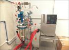 Unused Buchi Glass Mini Pilot 10  System consisting of: Glass reactor vessel 10 litres, stirrer unit, scaffolding complete , stainless steel (floor version) documentation, assembled.  Dimensions 1.9 ...