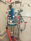Unused Buchi Glass Mini Pilot 10  System consisting of: Glass reactor vessel 10 litres, stirrer unit, scaffolding complete , stainless steel (floor version) documentation, assembled.  Dimensions 1.9 ...