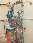 Unused Buchi Glass Mini Pilot 10  System consisting of: Glass reactor vessel 10 litres, stirrer unit, scaffolding complete , stainless steel (floor version) documentation, assembled.  Dimensions 1.9 ...