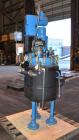 Used DeDietrich Clamp Top Glass Lined Reactor, 30 Gallon, 9115 Blue Glass. Vertical. Approximately 19-1/2’’ diameter x 24’’ straight side, dished bolt on top, dish bottom. Internal rated 150/FV psi a...