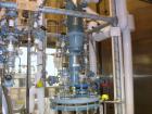 Used Buchi Reactor Train consisting of: (1) Buchi 70 liter glass reactor, removable dish top, dish bottom. Internal rated -1/+0.5 bar (-14.5/7.2 psig) +200/-50 deg C, jacket rated 10 bar (145 psig) a...