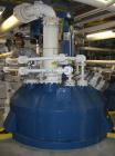 Used Pfaudler Glass Lined Reactor, approximately 2114 gallon (8,000 liter working capacity), vertical. Welded dished top and bottom. Internal rated 6.6 bar/full vacuum (95 psi/FV) at -29 to 200 deg C...