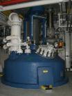 Used Pfaudler Glass Lined Reactor, 9145 glass, vertical. Approximately 3303 gallon(12,500 liter) working capacity, 14,360 liter total. Dished welded top and bottom. Internal rated 6.6 bar/full vacuum...