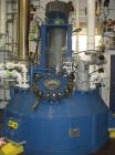 Used Pfaudler Glass Lined Reactor, 9145 glass, vertical. Approximately 3303 gallon  (12,500 liter) working capacity. Dished welded top and bottom. Internal rated 6.6 bar/full vacuum (95 psi/FV) at -2...