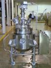 Used Pfaudler Glass Lined Reactor, 30 Gallon. Dished top, coned bottom. Internal rated 100 psi & FV at 450/-100 degrees F, stainless steel jacket rated 90 psi at 350/-100 degrees F.. Pfaudler DTW agi...