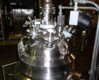 Used Pfaudler Glass Lined Reactor, 30 Gallon. Dished top, coned bottom. Internal rated 100 psi & FV at 450/-100 degrees F, stainless steel jacket rated 90 psi at 350/-100 degrees F.. Pfaudler DTW agi...