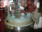 USED: 500 gallon Pfaudler glass lined reactor rated 100 psi @ 450 deg F internal, jacketed for 100 psi @ 450 deg F. 3.5 RW Pfaudleragitator drive with mechanical seal, 5 hp 460 volt XP motor, 4 blade...