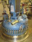 Used Tycon Glass Lined Reactor, 700 Gallon / 2,649 Liters.  Type 808 Glass. Internal rated 150 psi and full vacuum at 450 degrees F, jacket rated 100 psi at 450 degrees F. Full clamp top with air ope...